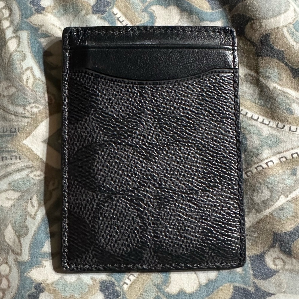 Authentic coach money clip.